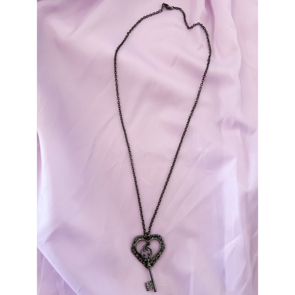 Heart and key necklace.